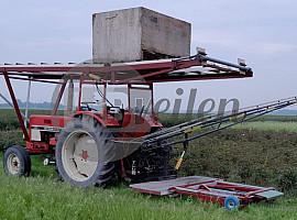 Tractor met oogstband