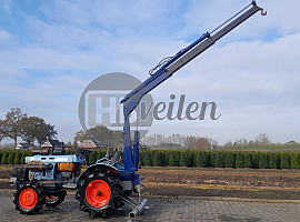 Tractor met hijskraan  